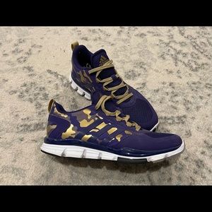 Purple and gold Adidas sneaker